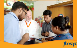 Therap Global team having a look on the documentation format of Blue Bird Special School, Dhaka