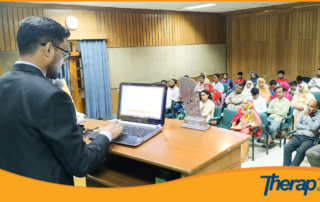 Therap Global training and implementation specialist is demonstrating Therap Modules to the Rangpur workshop attendees