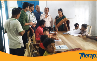 a special teacher describing the activities of this class to Therap Global team