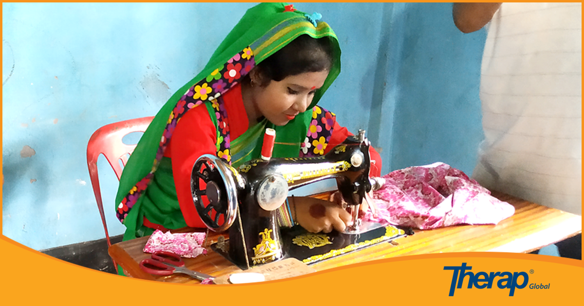 A special child is stitching a dress by a sewing machine in Autism Buddhi Protibondhi Biddaloy, Gaibandha