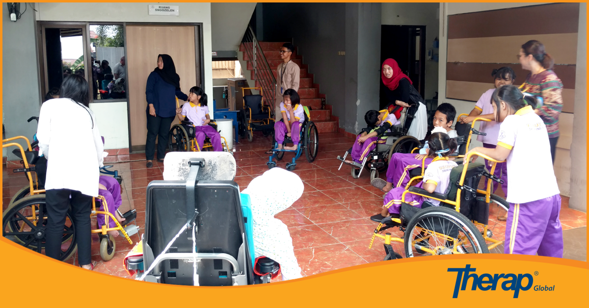 Some physically handicapped children of Yayasan Sayap Ibu Cabang Provinsi Banten are seated in wheelchair